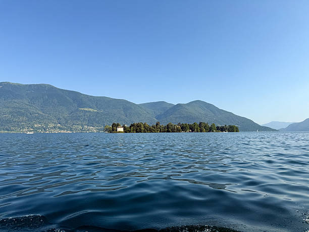 istock Scenic View of Serene Lake with Mountainous Backdrop 2220976421