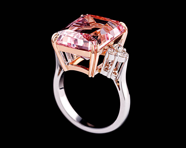 istock white metal ring, silver, gold with morganite stone and diamonds on black background 2220977044