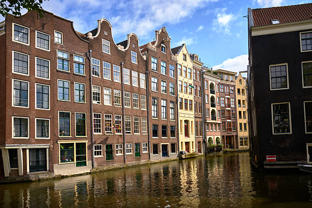 De Wallen houses on the Oudezijds Voorburgwal Canal near the Red-Light district in Amsterdam.