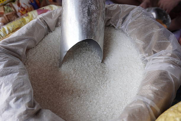 istock Sugar in a bag with a large scoop inside of it 2220978393