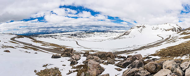 The Beartooth Highway Panorama in early Springtime with lots of snow over the mountains. Montana.