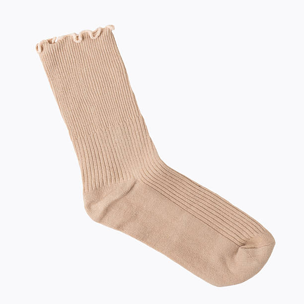 istock Beige ribbed sock with ruffled edge on white background 2220989018