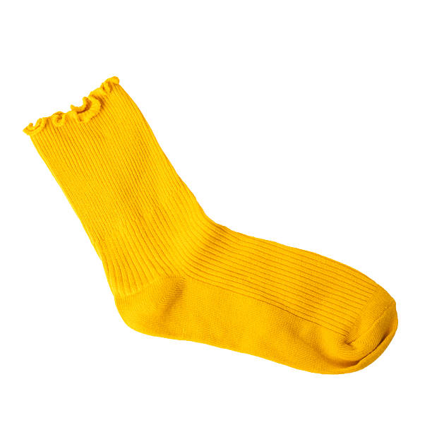istock Bright yellow knitted sock with ruffled top on white background 2220990598