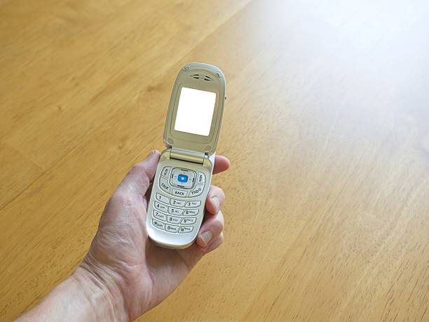 Close up of a old mobile phone on a table.