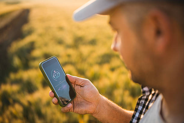 istock Farmer is using AI chatbot assistant in his Agriculture field. 2221001571