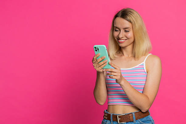 istock Woman use smartphone typing new post on web message browsing addiction of social networks play game 2221007311