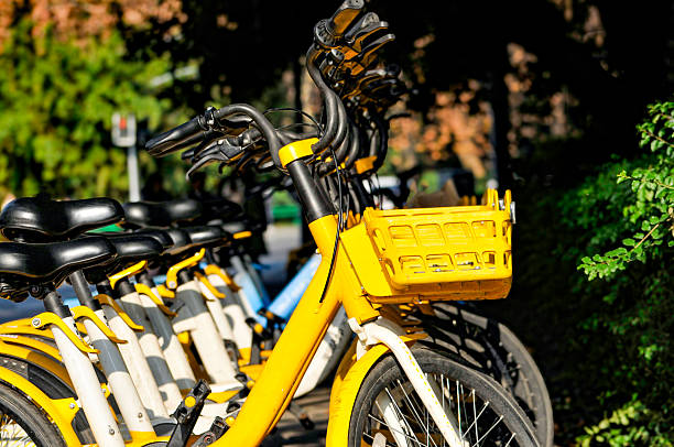 istock yellow bikes on the street 2221008243