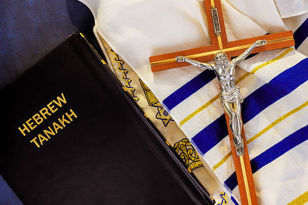 istock Religious items including a Hebrew Tanakh, cross, tallit Messianic Jewish Congregation 2221009734