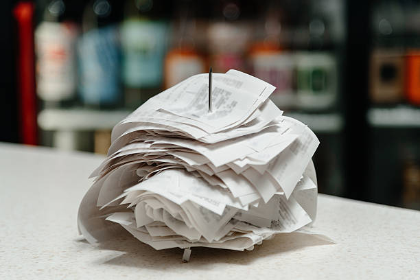 istock pile of spiked papers 2221009940