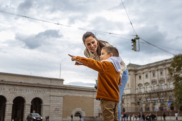 istock Mother and Child Exploring City During Daytime 2221011356