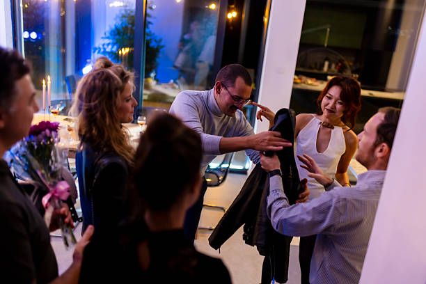 istock Friends Gathering in a Modern Home, Sharing Fun Moments and Celebration 2221011762