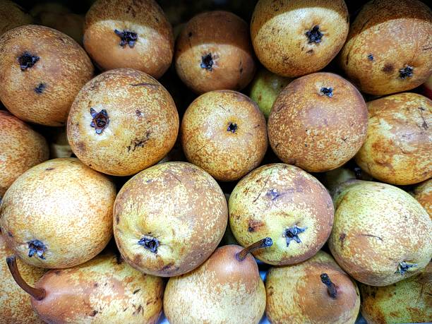istock Pears in a market 2221019174