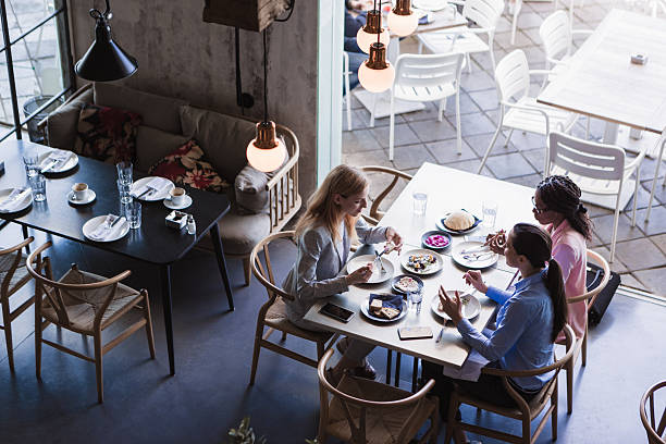 istock Casual Meeting in Modern Cafe 2221020333