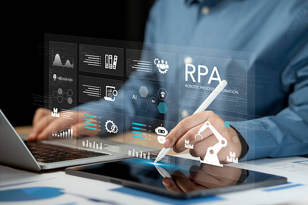 istock RPA Robotic process automation innovation technology concept. Businessman working on laptop using automate software system business for business and industrial workflow optimization. 2221024786
