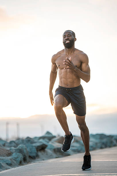 istock Fit Black Man Jogging by the Sea 2221024864