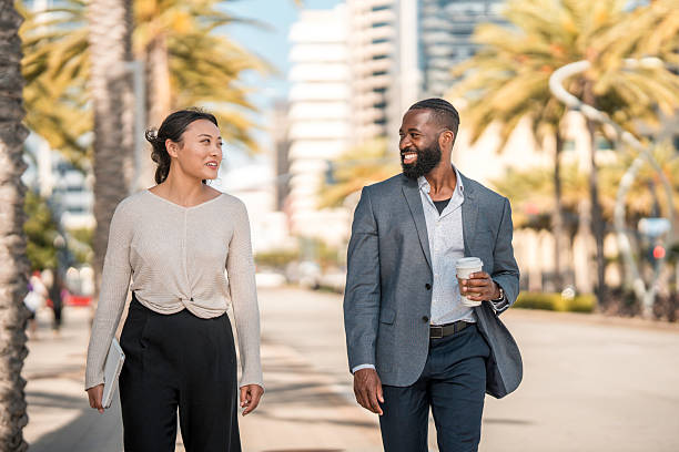 istock Diverse Business Colleagues Stroll in Urban Setting 2221025041
