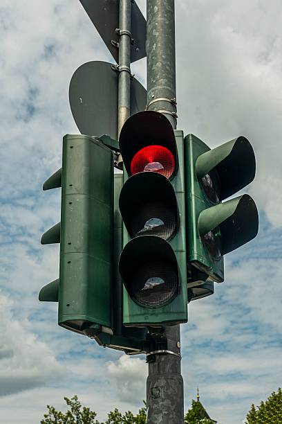istock Red light for vehicle traffic under bright daylight 2221025544