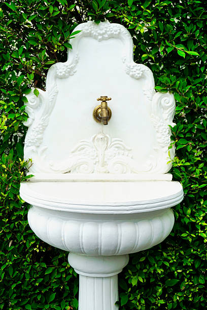White basin with classic style and pipe decorate at garden