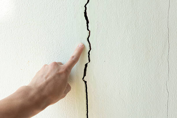 istock Crack or damage on concrete wall need repair. 2221028221