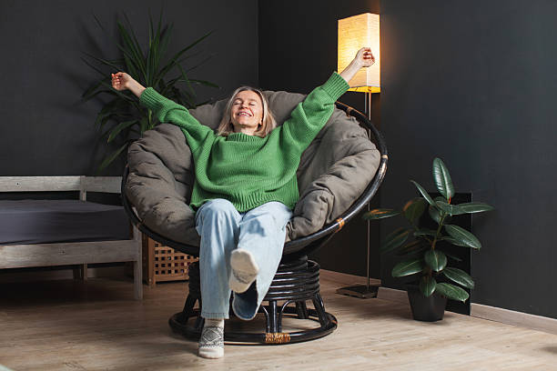 istock Happy middle aged Woman relaxing at home 2221030978