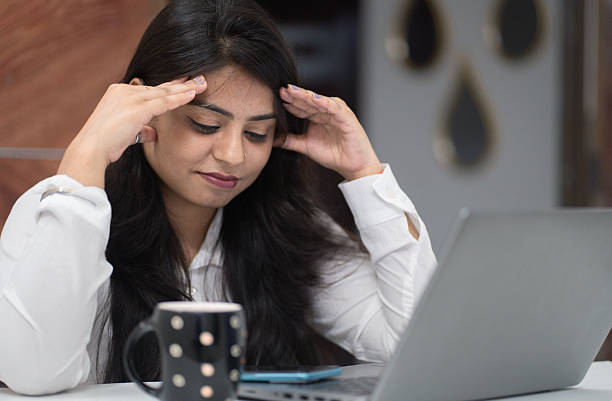 istock Frustrated Female Professional Struggling with Workload 2221031326