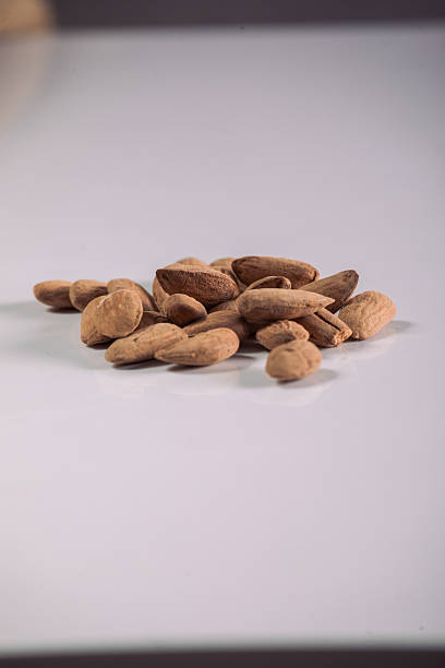 istock Almond Kernels on Brown Burlap and Kraft Paper – Rustic Natural Snack 2221034228