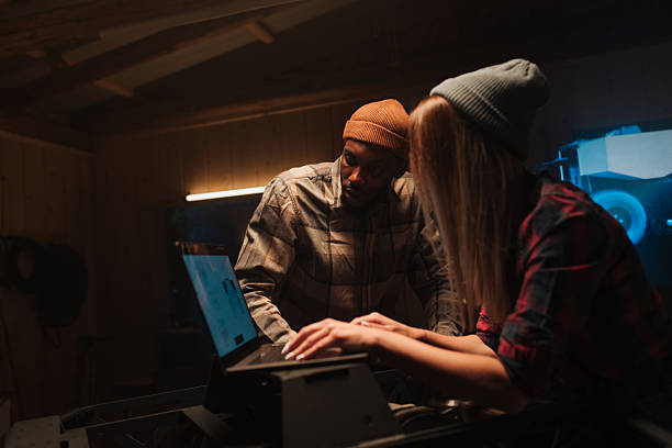 istock Robotics researchers collaborating on a laptop in a workshop 2221035243