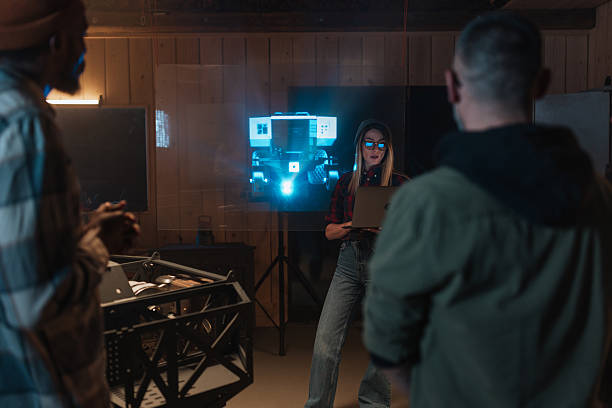 istock Team of robotics researchers collaborating on a project using holographic technology 2221035249