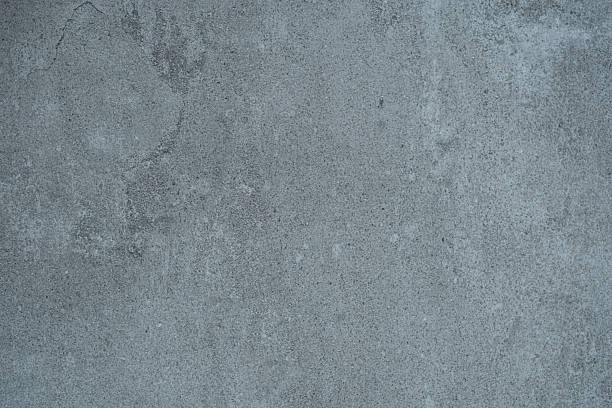 istock Blue toned concrete wall texture background with fine details and surface grain 2221040266