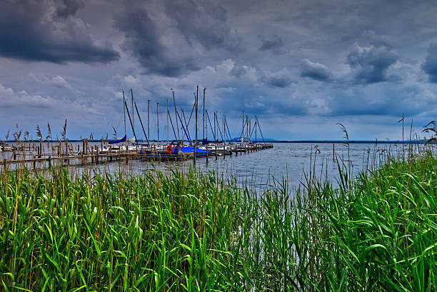 istock Sailboats docking at steinhude lake under dramatic sky, lower saxony, germany 2221042650