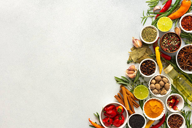 istock An array of culinary herbs and spices arranged on a gray background, adding aromatic accents perfect for enhancing flavor, top view and copy space 2221048902