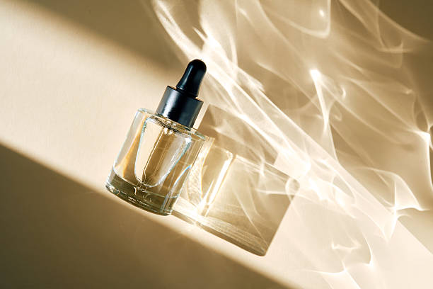 istock Facial serum on a beige background with beautiful highlights. 2221051513