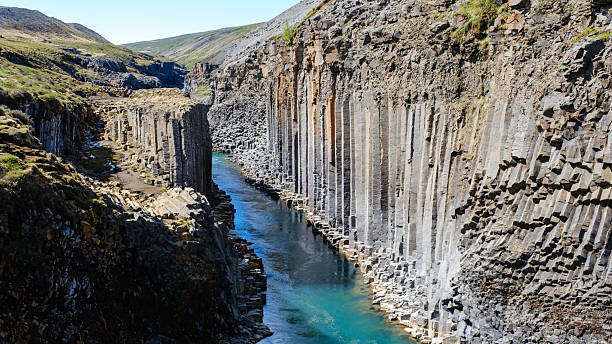 istock Explore the stunning basalt formations and turquoise waters of Studlagil Canyon in Iceland 2221051777
