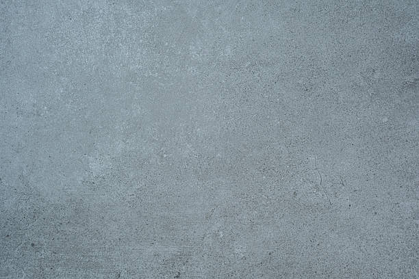 Blue toned concrete wall texture background with fine details and surface grain