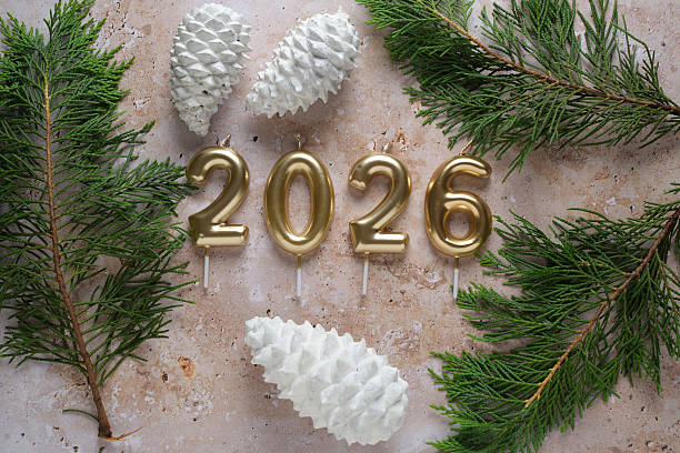 istock Festive New Year 2026 Celebration With Candles and Pine Cones 2221055983