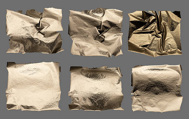 istock Bright silver and gray foil texture with a pearlescent, glossy finish. Torn, ragged edges create a 2221056925