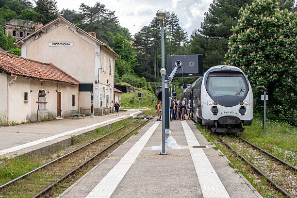 Vizzavona, Corsica, France - 257th May 2025: Passenegers board a train at Vizzavona station on the GR20 trail in the heart of the Mediterranean island of Corsica