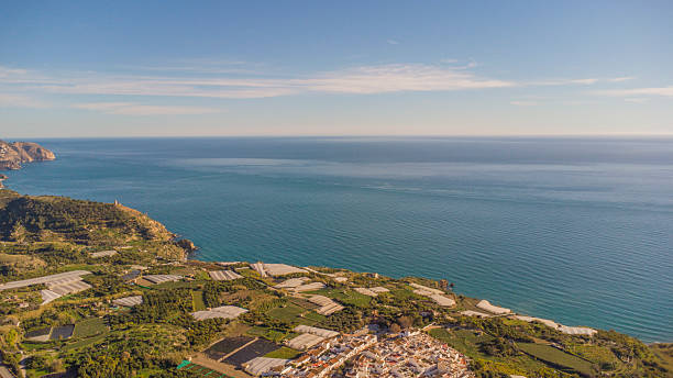 istock Drone Capture of Nerja's Seaside and Hills at Sunset 2221065480
