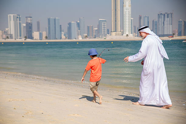 istock Two generations fishing together 2221072952