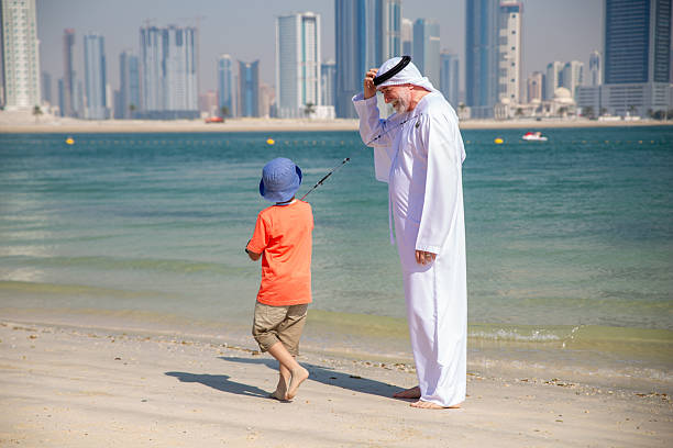 istock Two generations fishing together 2221073027