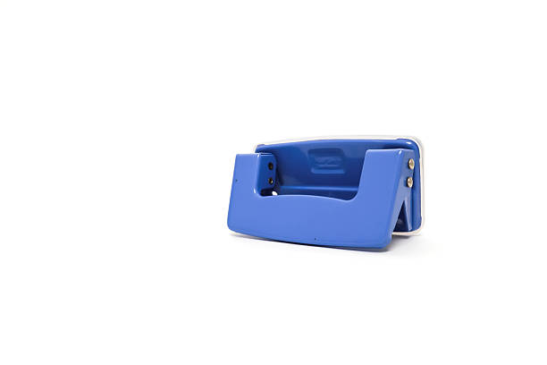 istock Isolated blue hole punch stationery item for office use and creative paper crafting projects with a clean white background 2221077115