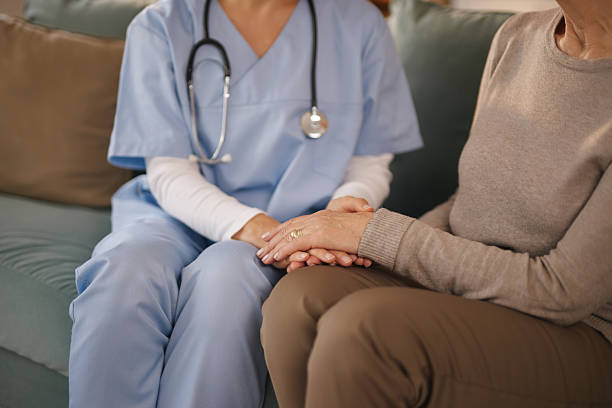 istock Compassionate home nurse providing supportive care 2221080833