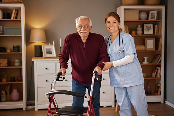 istock Senior man receiving support from caring nurse 2221082327