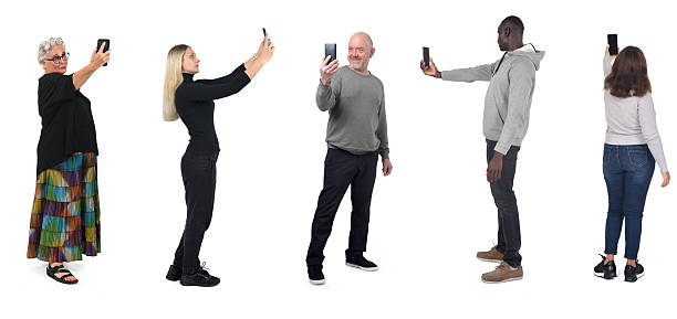 istock group of people taking a self-portrait with smartphone on white background 2221084213