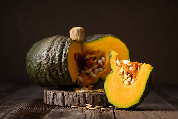 istock Pumpkin with green skin and orange pulp 2221089926
