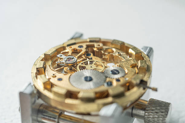 istock Part of clockwork with gears, spring, ruby. Steel and brass. 2221097070