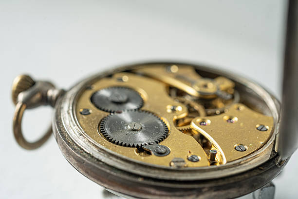 istock Part of clockwork with gears, spring, ruby. Steel and brass. 2221097078