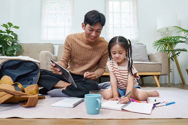 istock Back to School. Engaging father and daughter study session at home. 2221102790