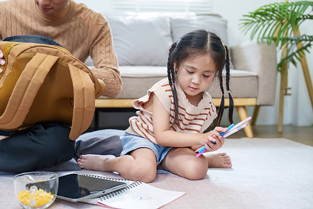 istock Father and Daughter Learning Together. Engaging in homework and creativity. 2221102913
