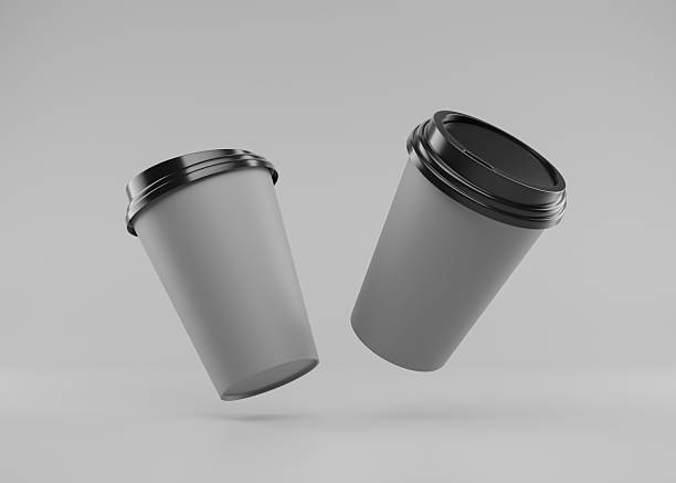 istock paper coffee cup with back lid on gray background, cup mock up. 2221107155